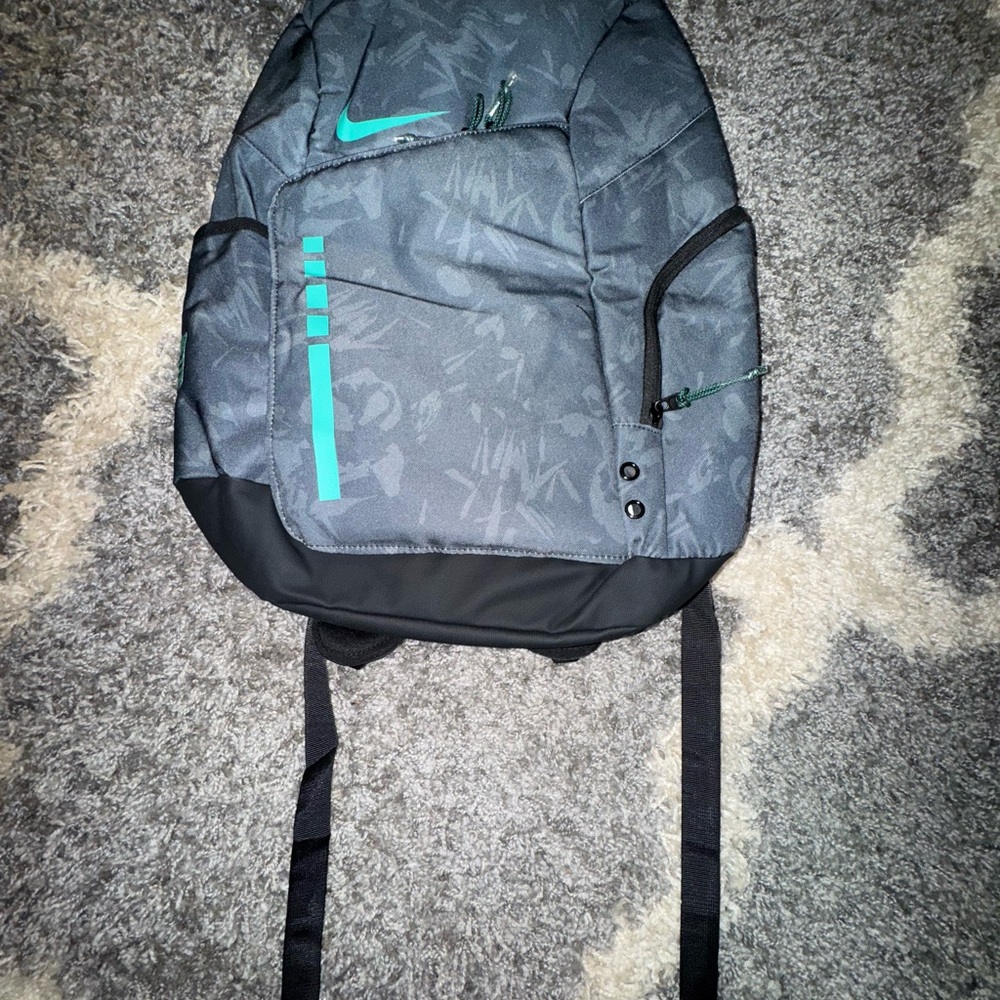 Nike Gray and Black Backpack with Teal Accents